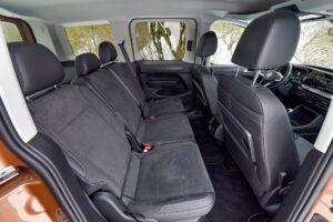 Volkswagen Caddy 5 Style 2.0 TDI, Kabineninnenraum mit umgeklappten Rücksitzen.